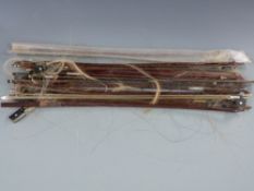 A collection of violins and cello bows to include Stentor, German and Czechoslovakia examples,