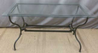 Glass topped dining table,