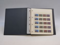 An album containing an omnibus set of Churchill stamps,