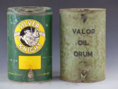 Vintage Silver Knight oil dispenser can and a similar Valor oil drum