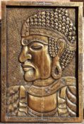 Large gilt carved panel of an Eastern deity,