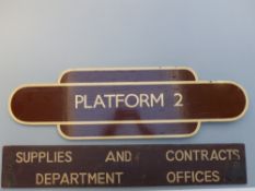Two wooden railway signs, one Platform 2 the other Supplies and Contracts Department Offices,