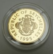 1995 Seychelles gold proof 100 rupees coin to commemorate the Queen Mother's wedding 1923 with