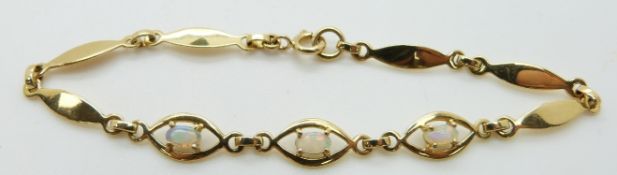 An 18ct gold bracelet set with opals, 5.5g