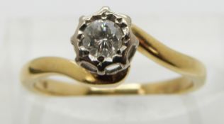 An 18ct gold ring set with a diamond of approximately 0.2ct in a platinum setting, size J