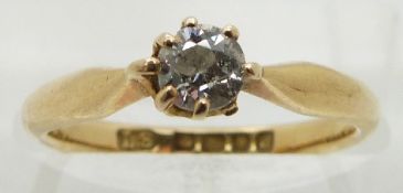 An 18ct gold ring set with a round cut diamond of approximately 0.25ct (size K/L)