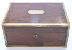 A 19thC brass bound campaign style rosewood workbox with brass and inlaid decoration and Bramah