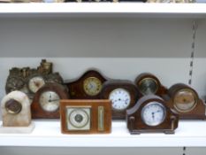A collection of various small mantel clocks, most mid twentieth century, to include 8 day examples