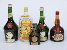 Five bottles of alcohol including DOM Benedictine 100cl, 40% vol, similar 75cl and Grand Marnier 40%