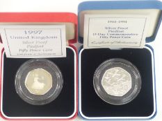 Two cased silver Piedfort coins comprising 1994 D Day 50p and a 1997 example