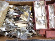 A large quantity of boxed and loose silver plated and other cutlery, many matching