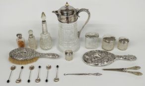 Seven various hallmarked silver mounted dressing table bottles, hallmarked silver mounted hand