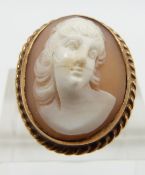 A 9ct gold ring set with a shell cameo, size N