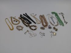 A silver coin necklace, silver and paste necklace, faux pearls, etc