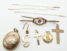 A 9ct gold St Christopher, two 9ct gold cross pendants, 5.4g, brooch, Victorian locket etc
