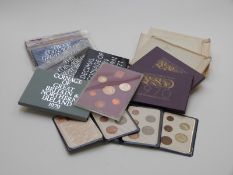 Ten Royal Mint UK coinage brilliant uncirculated coin sets, 1970's and 1980's and some First Decimal