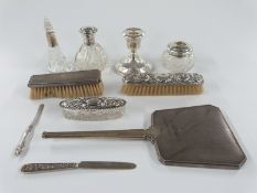 Hallmarked silver mounted items including hand mirror, two books, three dressing table pots or