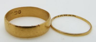 Two 22ct gold wedding bands/ rings, Birmingham 1902, 5.2g, Sizes O & Q