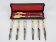 A set of six French white metal bladed knives with French silver marks and maker's mark BP, weight