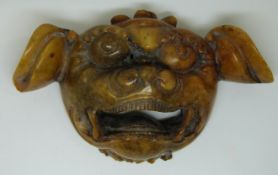 Chinese soapstone Dog of Fo mask with engraved character mark verso. 11cm x 5.5cm x 3.5cm