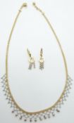 A 14ct bi-coloured gold necklace and matching earrings by Midas, 14.9g