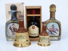 Five bottles of alcohol comprising two Beam 10 year old whisky, 80% proof, 750ml, one boxed, 37.