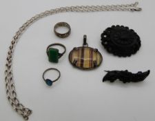 A Blue John pendant, silver chain/ necklace, two jet brooches, an Arts & Crafts ring and two