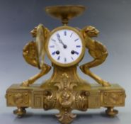 Nineteenth century gilt brass mantel clock with enamel Roman dial, Brequet style hands, the French