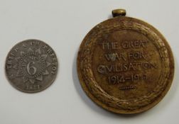 R.Tripp and Co, Bristol 1811 sixpence token and a WWI medal awarded to K9811 E.Bevan S.P.O R.N