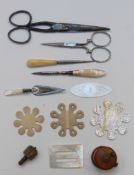 Chinese mother of pearl thread holder, teetotum, boxwood measuring tape, silver bookmark etc