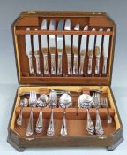 Four stainless steel canteens of cutlery including an Art Deco style set with green handles
