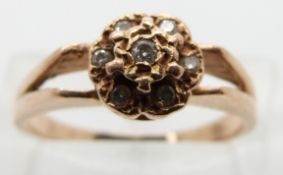 A 14ct rose gold ring set with diamonds, size N