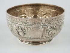 Victorian hallmarked silver pedestal bowl repoussé decorated in the Indian or Burmese style,