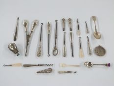 Hallmarked silver handled button hooks, glove stretchers etc, hallmarked silver teaspoon, Eastern
