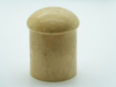 A 19thC width early 20thC ivory lidded pot and two ivory letter openers, height 7.5cm