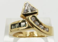 A 14ct gold ring set with cubic zirconia and topaz, size O