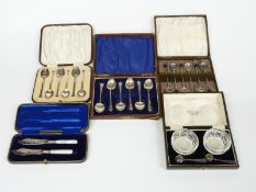 A quantity of cased cutlery including a set of six hallmarked silver teaspoons, weight 31g, a pair
