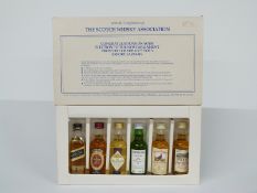 A boxed gift set of six 5cl whiskies comprising Johnnie Walker, Singleton, Invergordon, Laphroaig,