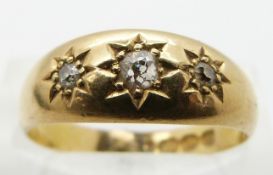 Victorian 18ct gold ring set with three old cut diamonds in star settings, Birmingham 1890, size O