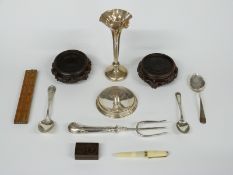 Hallmarked silver pin tray, hallmarked silver teapot, vase, hallmarked silver spoon and a spoon