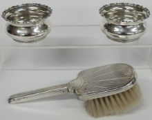 A pair of Gorham white metal open salts marked sterling, diameter 6.5cm, 74g and a brush marked