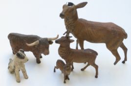 Four cold painted spelter animals including deer, terrier etc, largest 15cm tall