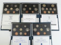 Royal Mint UK proof coin sets in deluxe cases comprising 1987 - 1991 inclusive