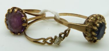 A 9ct gold ring set with an amethyst and two other 9ct gold rings