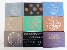 Nine 1970s Coinage of Great Britain coin sets comprising 1970, 1971, 1971, 1974, 1975, 1976, 1977,