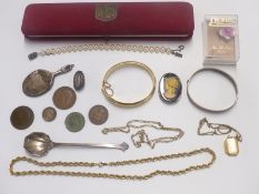 A silver bangle, yellow metal locket, Victorian silver brooch, silver spoon etc