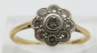 An 18ct gold cluster ring