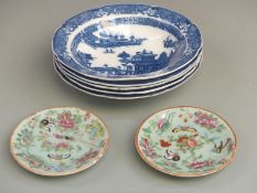 A collection of 19thC Chinese blue and white bowls and two plates
