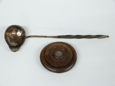 Continental white metal toddy ladle with horse's head mark to bowl, length 26.5cm together with a