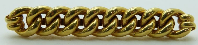 An 18ct gold curb link brooch, 8g
